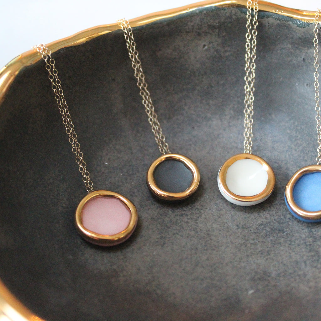 Gold circle necklace blue